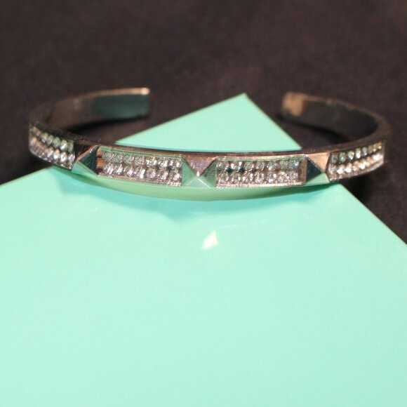 Silver-Tone Cuff Bracelet with Crystal Accents & Pyramid Stud Design - Picture 2 of 5